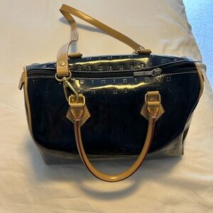 Elegant Black and Tan Handbag